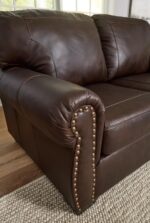 Signature Design by Ashley Colleton Classic Leather Match Sofa with Nailheads, Dark Brown - Image 10
