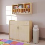 Foundations SafeSwing Daycare Changing Table, Formerly SafetyCraft - Durable Wood Cabinet with 2 Built-in Shelves - Storage w/Soft Close Hinges, Includes Durable Mattress Pad - Natural - Image 3