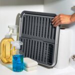 OXO Good Grips Aluminum Fold Flat Dish Drying Rack, 2-Tier, with Drainboard, for Kitchen Counter, Collapsible - Image 9