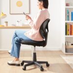 Amazon Basics Rolling Desk Chair, Adjustable, Low Back, Padded Seat, Breathable Mesh, Swivel, Black, 21.25" D x 22.5" W x 38" H - Image 3