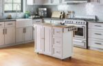 Homestyles Dolly Madison Off-White Mobile Kitchen Island Cart with Wood Drop Leaf Breakfast Bar - Image 4