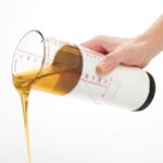 OXO Good Grips 2 Cup Adjustable Measuring Cup - Image 5